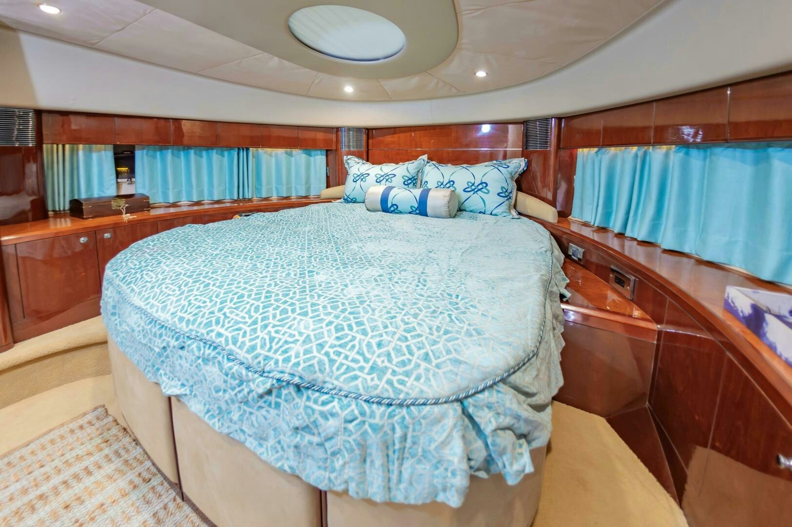 a bedroom with a bed and a desk aboard ANDREA'S REVENGE Yacht for Sale