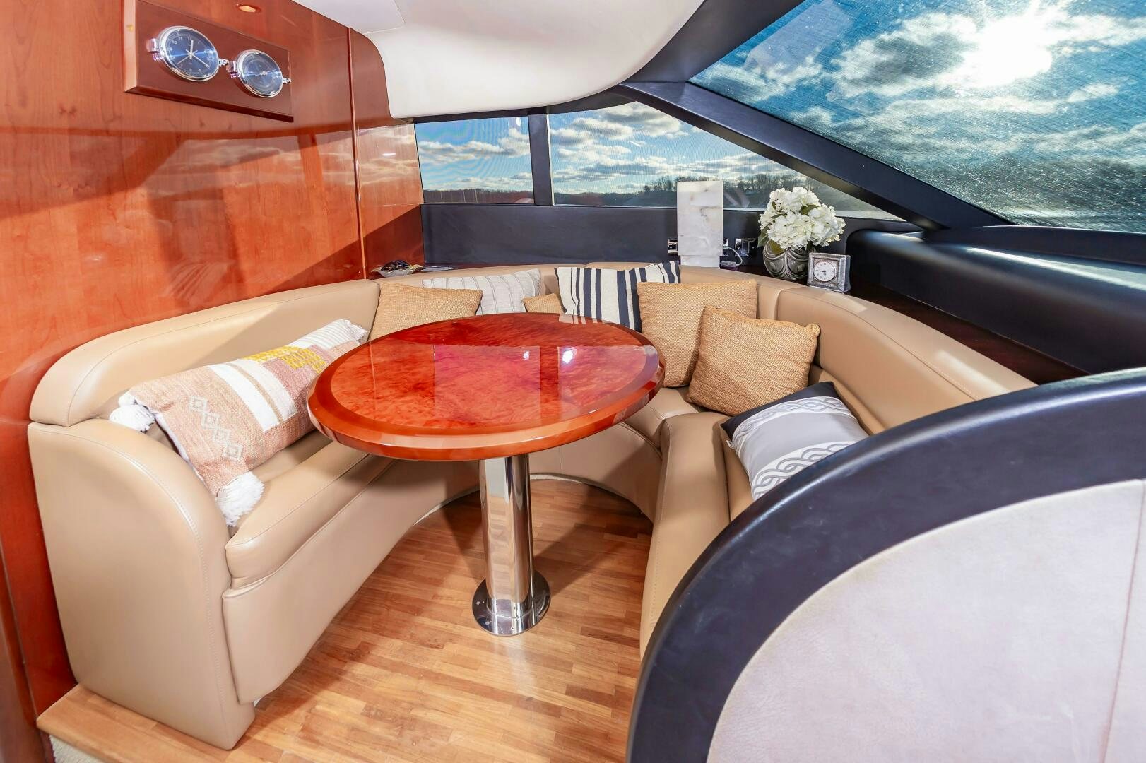 a living room with a table and chairs aboard ANDREA'S REVENGE Yacht for Sale