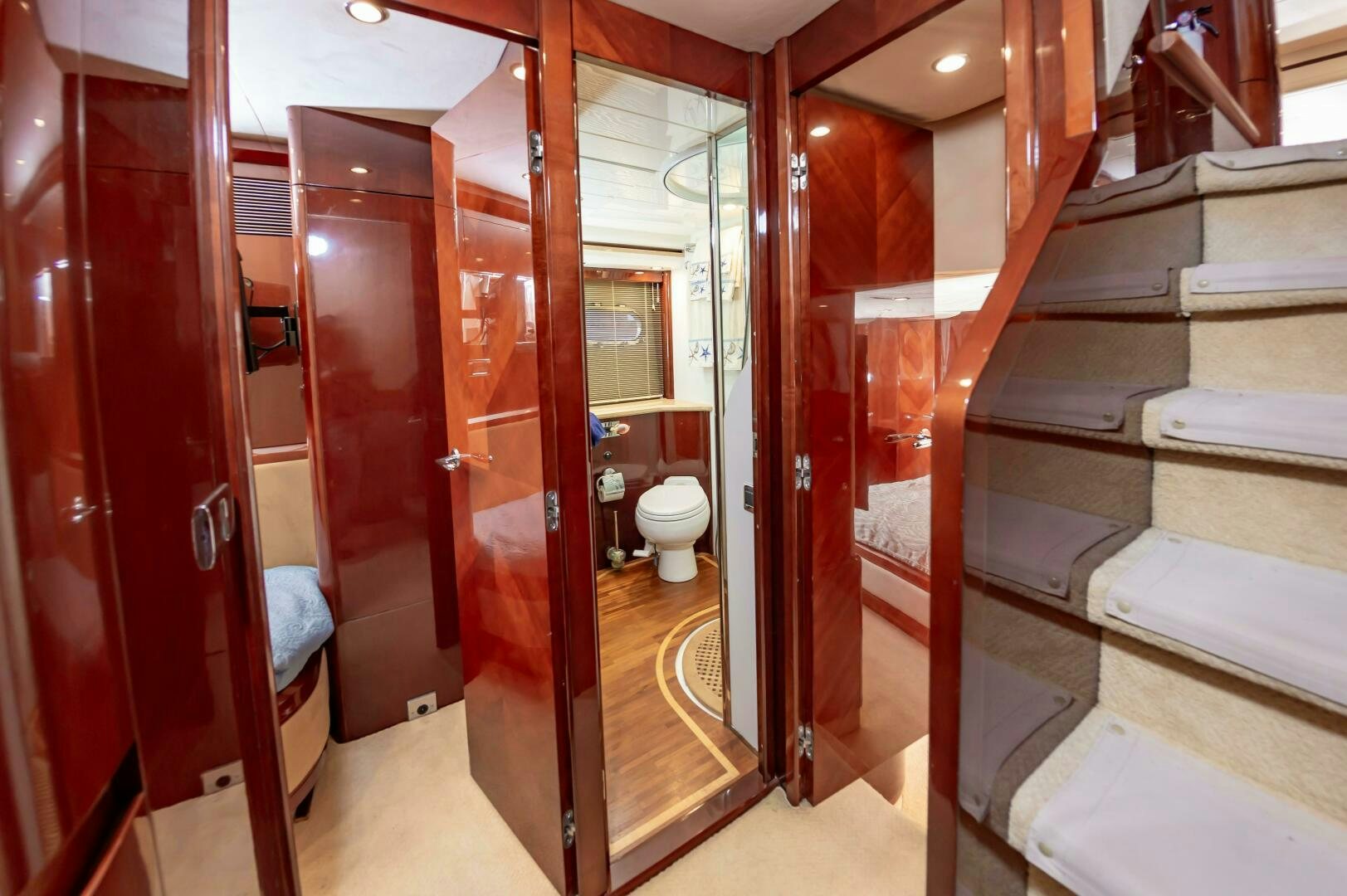 a bathroom with red walls aboard ANDREA'S REVENGE Yacht for Sale