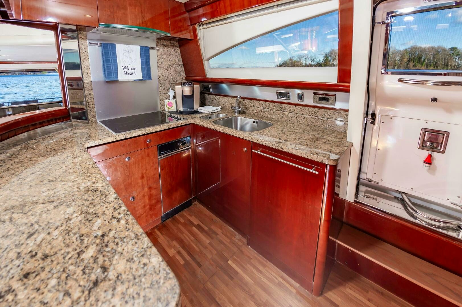 a kitchen with a large window aboard ANDREA'S REVENGE Yacht for Sale