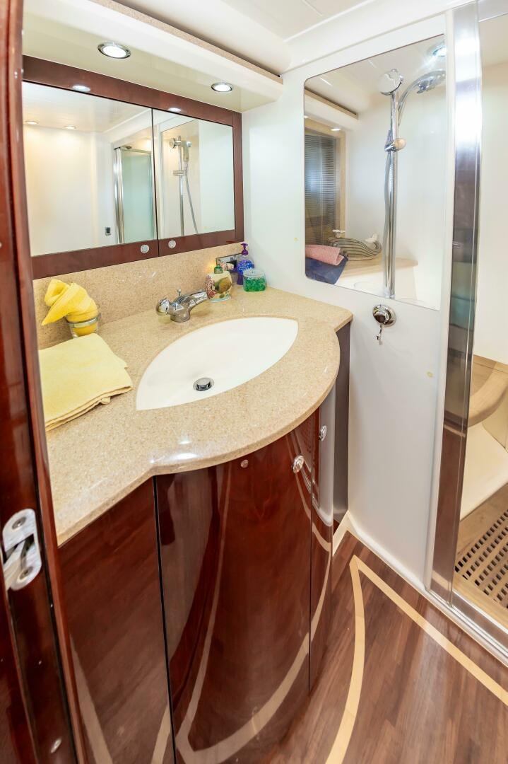 a bathroom with a sink and a shower aboard ANDREA'S REVENGE Yacht for Sale