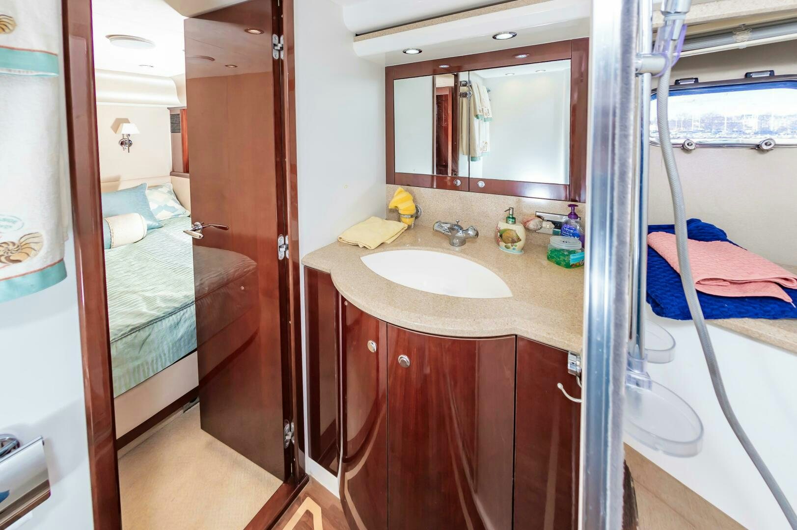 a bathroom with a sink and a mirror aboard ANDREA'S REVENGE Yacht for Sale