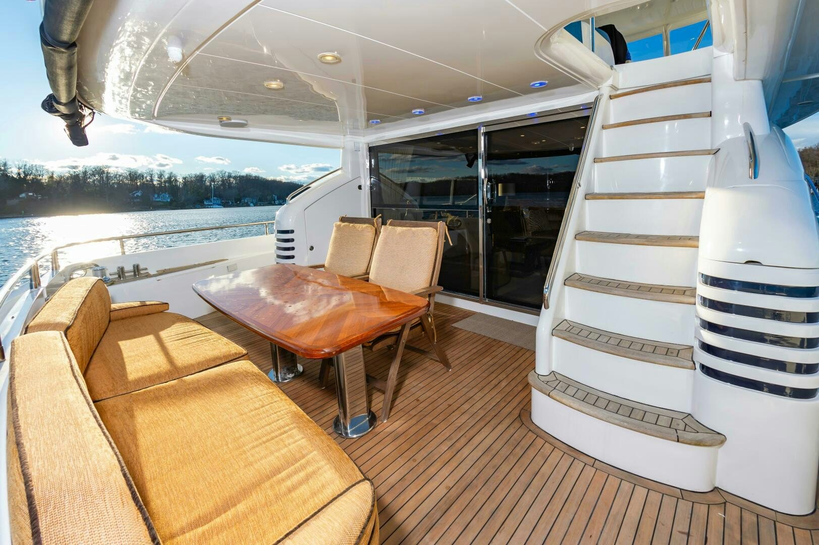 a boat with a chair and a couch on a deck aboard ANDREA'S REVENGE Yacht for Sale