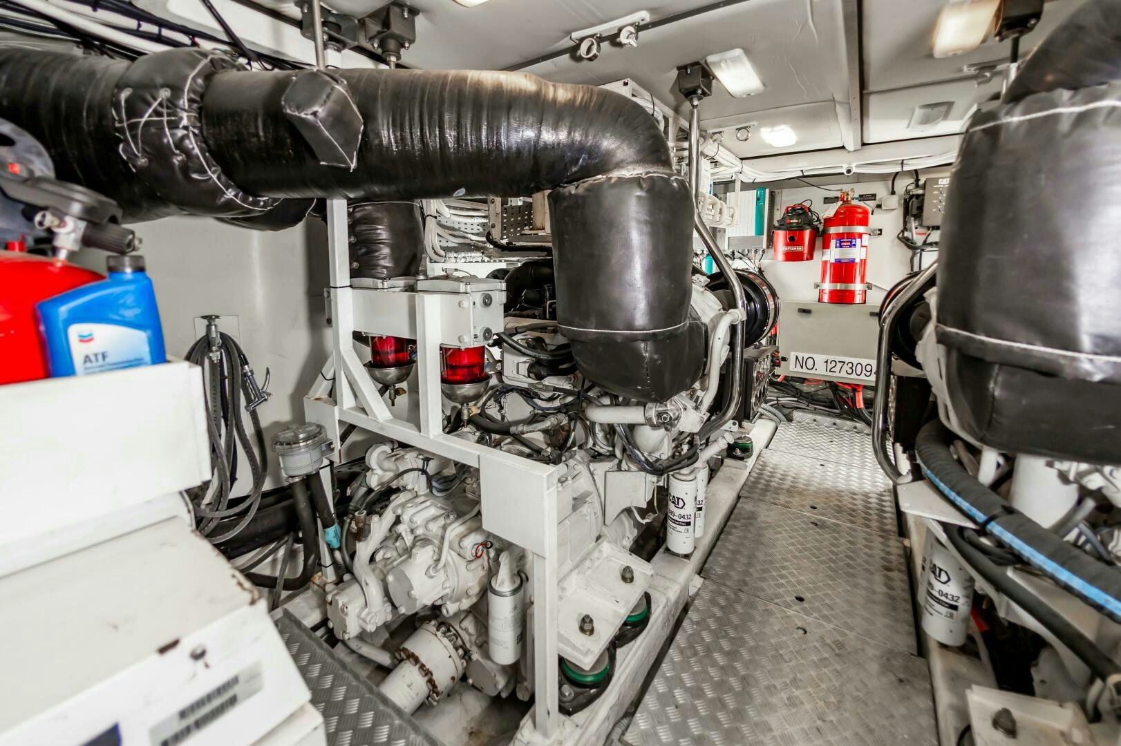 a machine with a large metal pipe aboard ANDREA'S REVENGE Yacht for Sale