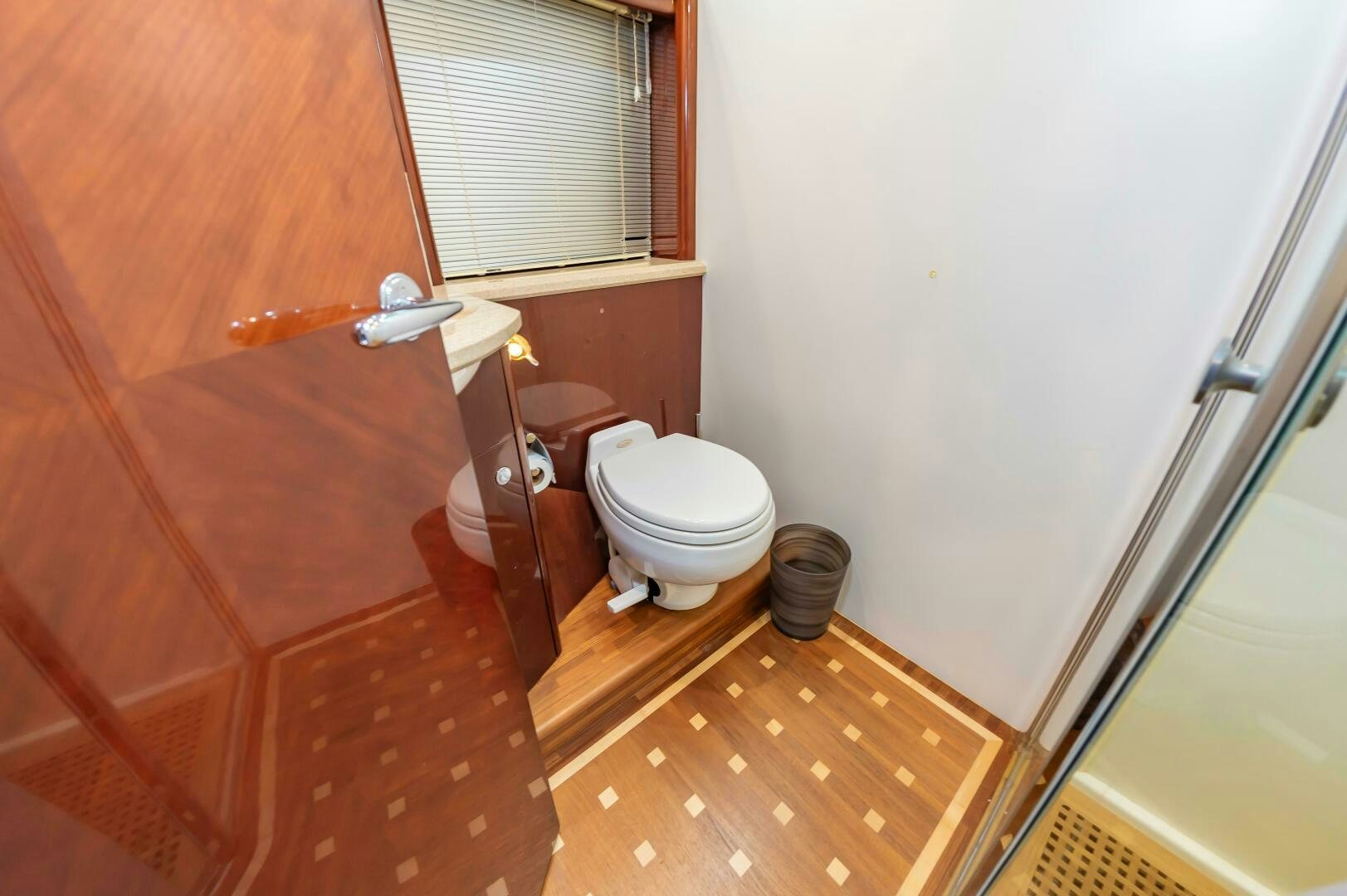 a bathroom with a toilet and a sink aboard ANDREA'S REVENGE Yacht for Sale