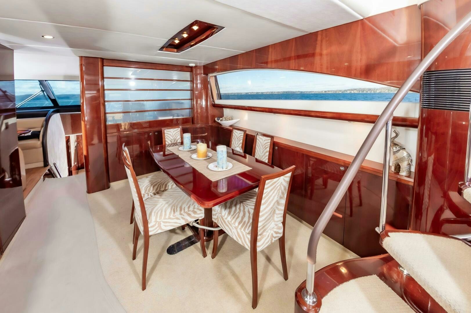 a table and chairs in a room aboard ANDREA'S REVENGE Yacht for Sale