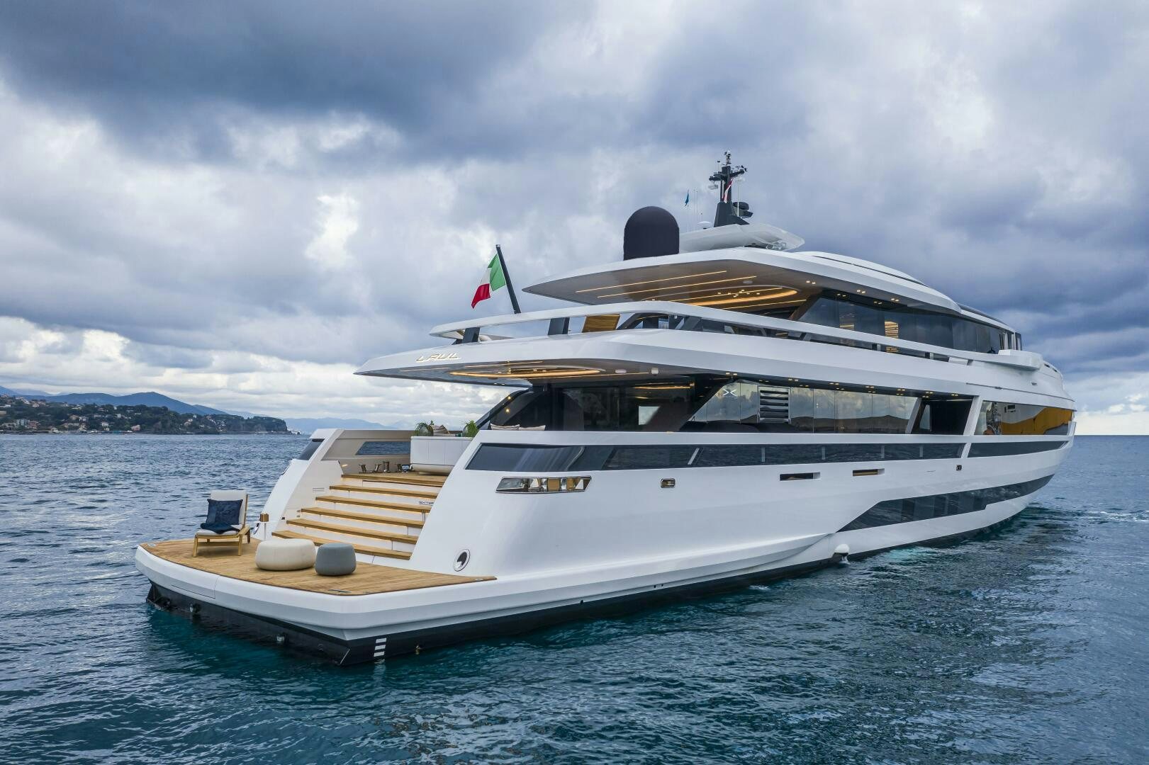 a large white yacht in the water aboard X130 TRIPLEX Yacht for Sale
