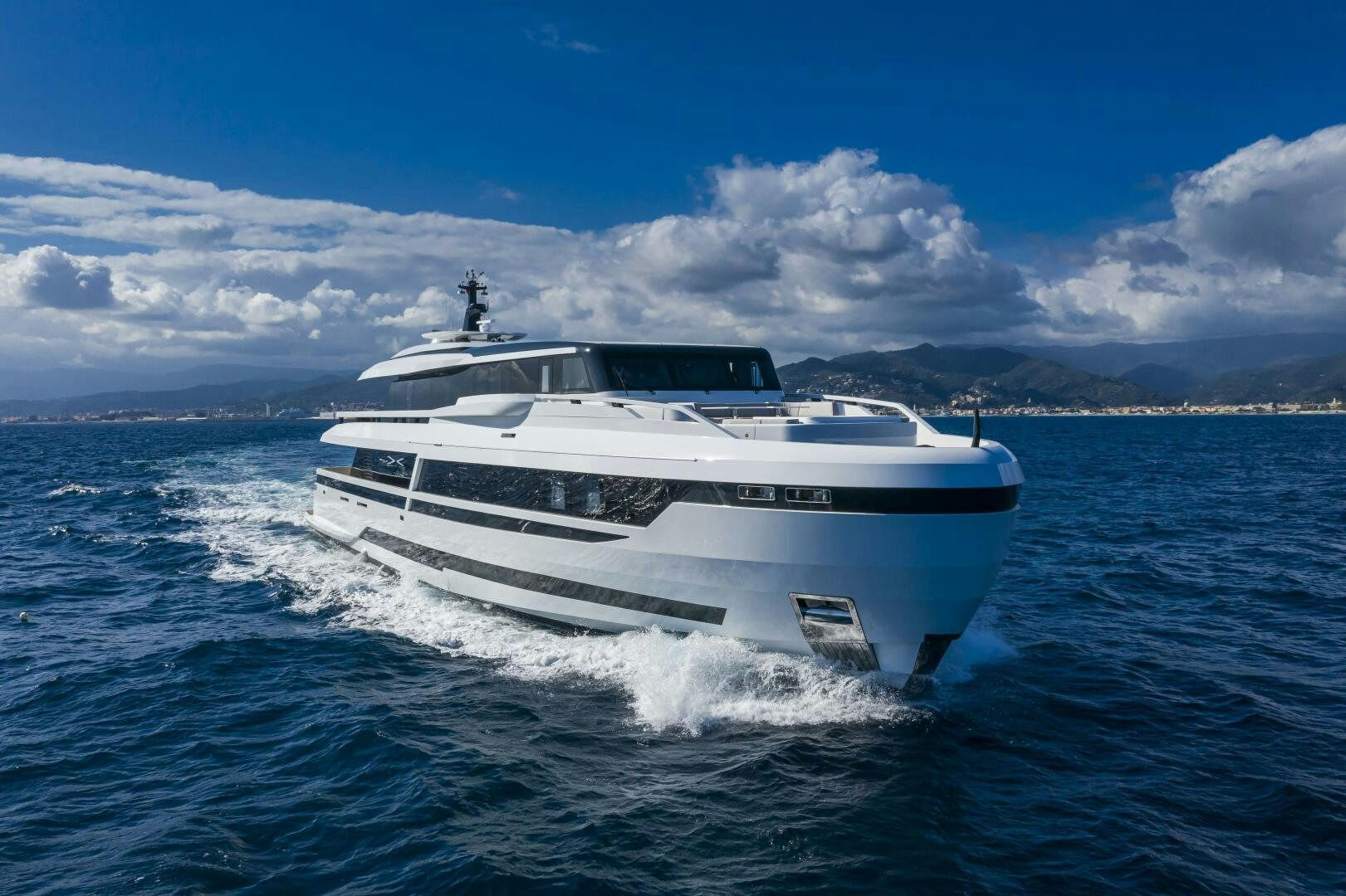 a boat on the water aboard X130 TRIPLEX Yacht for Sale