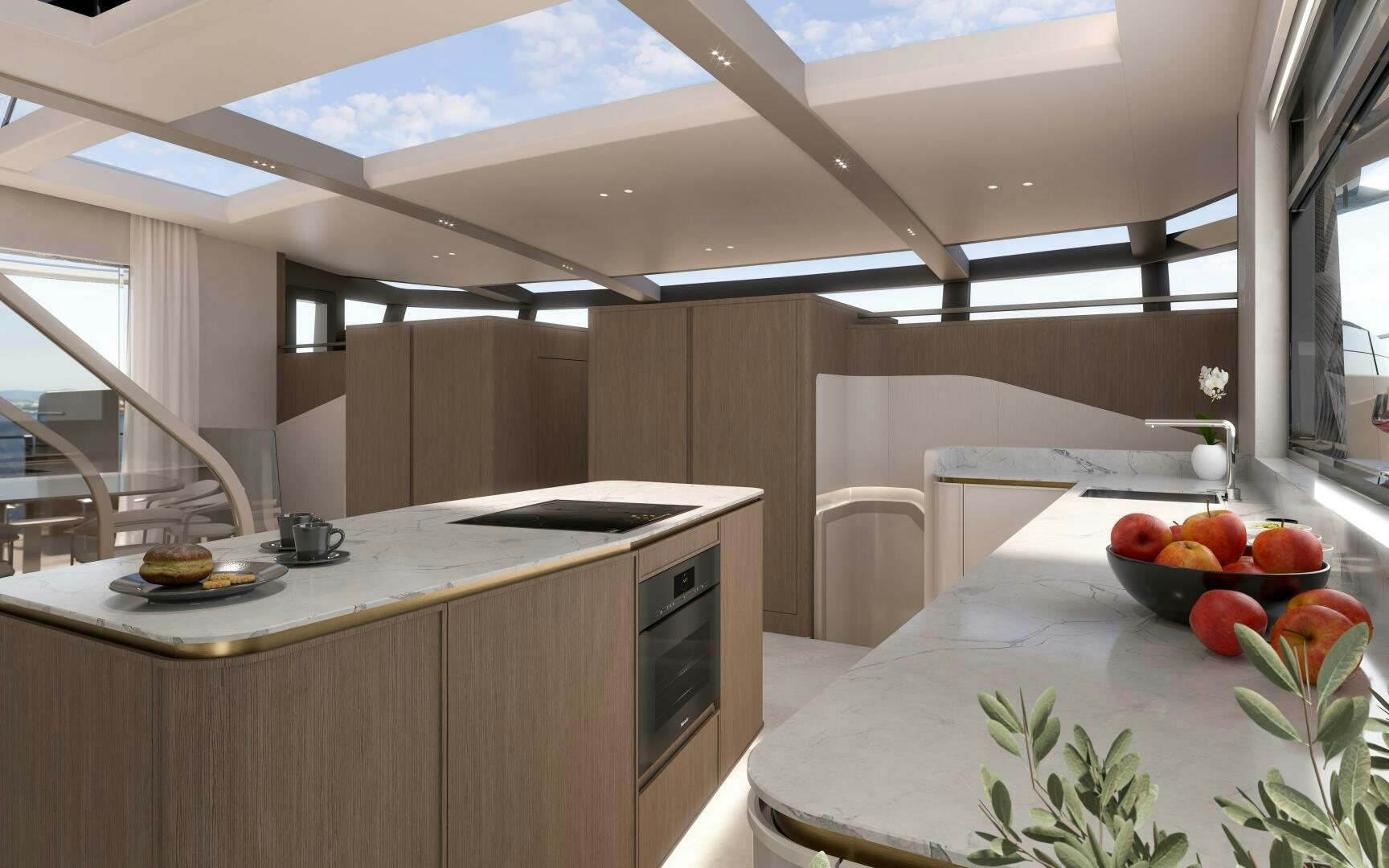 a kitchen with a table and a bowl of fruit aboard X30 VILLA Yacht for Sale