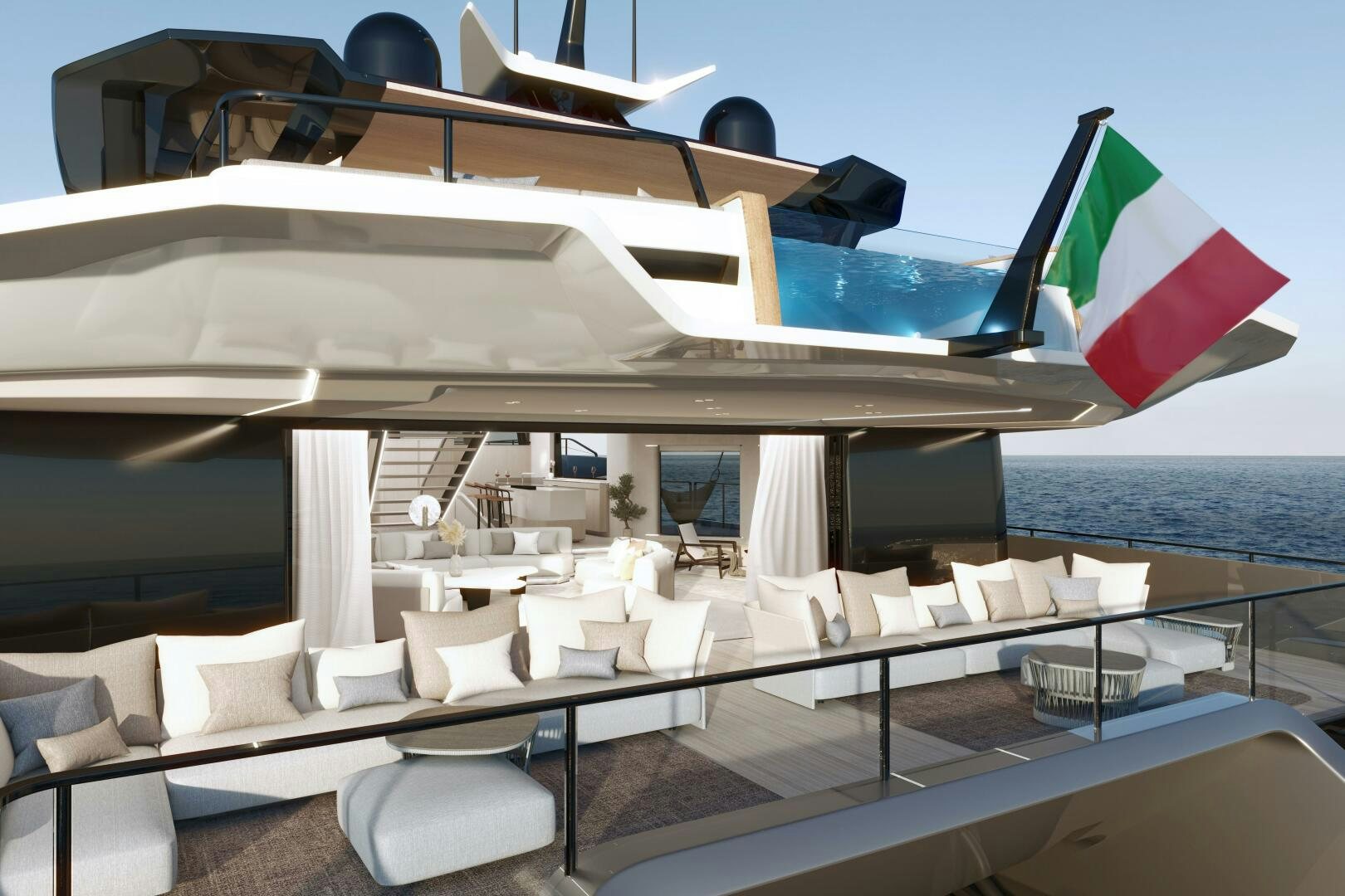 a large white boat with chairs around it aboard X30 VILLA Yacht for Sale