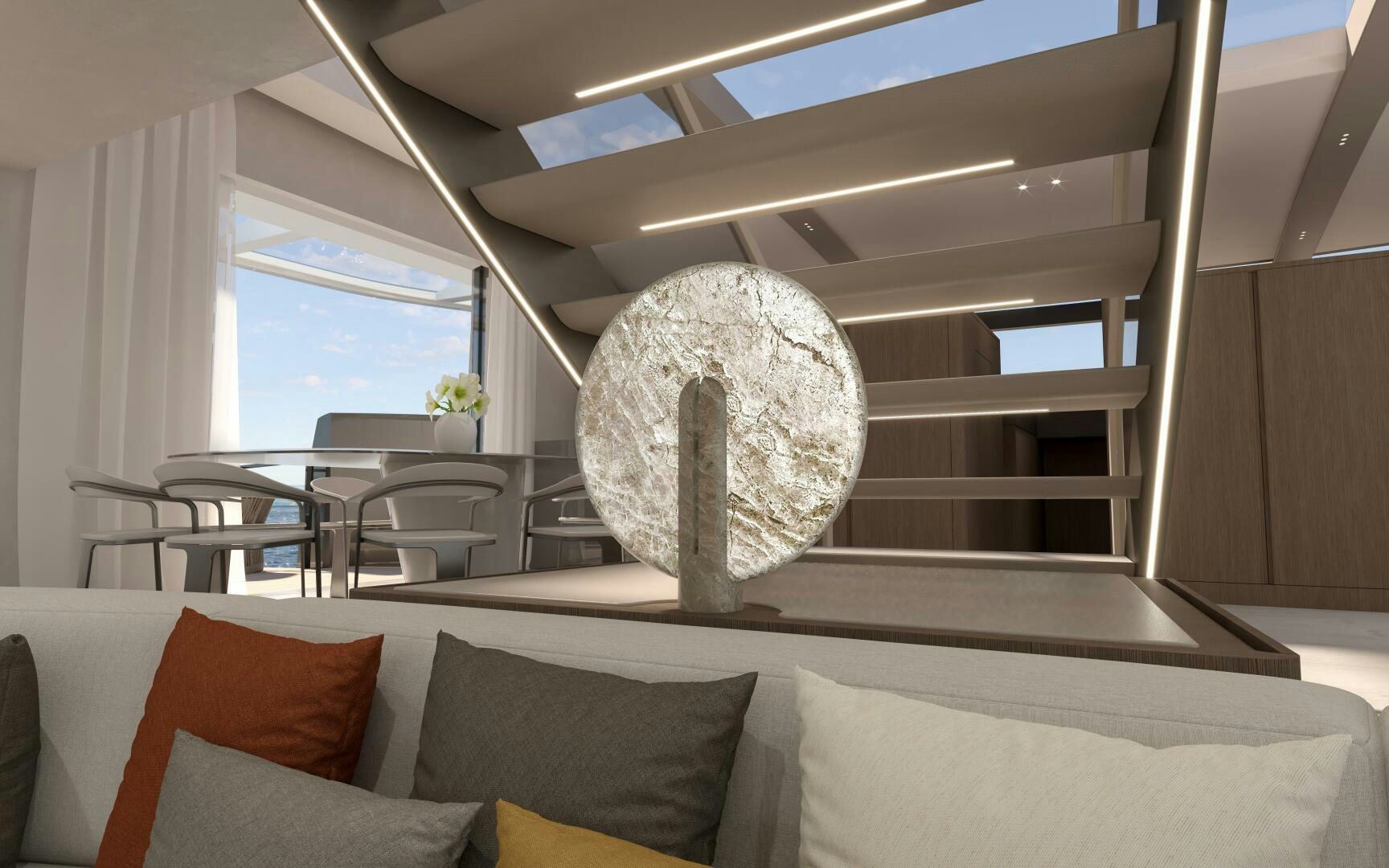 a large white spherical object on a table in a room with chairs aboard X30 VILLA Yacht for Sale