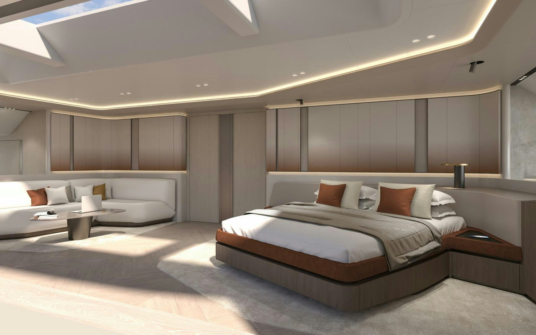 a room with a bed and a couch aboard X30 VILLA Yacht for Sale
