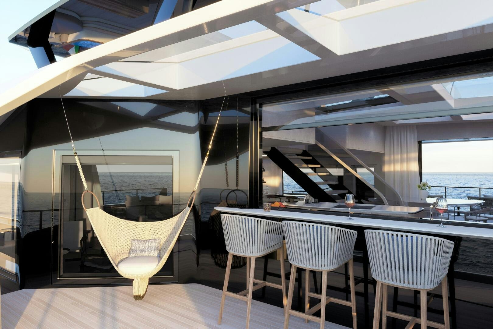 a room with a table and chairs aboard X30 VILLA Yacht for Sale