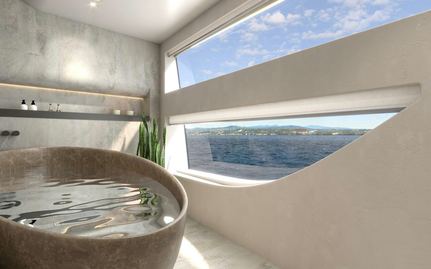 a large white bathtub with a plant in it aboard X30 VILLA Yacht for Sale