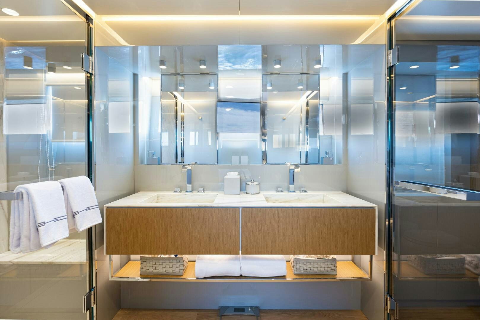 a bathroom with a large mirror aboard X99 FAST Yacht for Sale