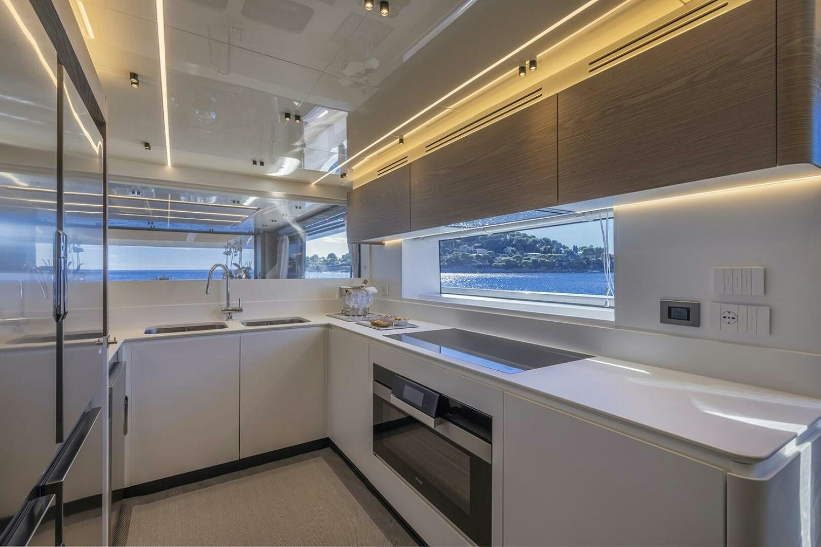 a room with a large window aboard X96 TRIPLEX Yacht for Sale