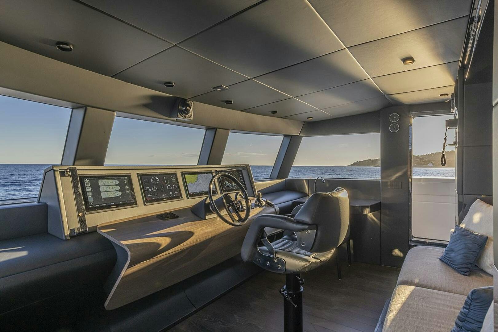 a boat with a seat and a seat on the front aboard X96 TRIPLEX Yacht for Sale