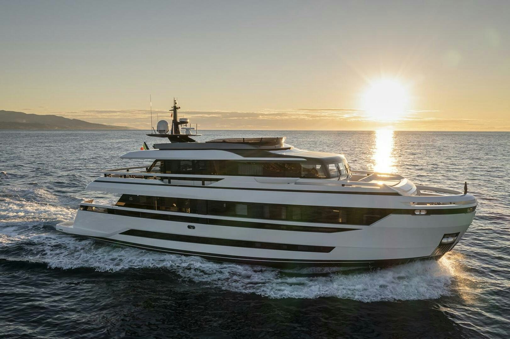 a white yacht in the water aboard X96 TRIPLEX Yacht for Sale