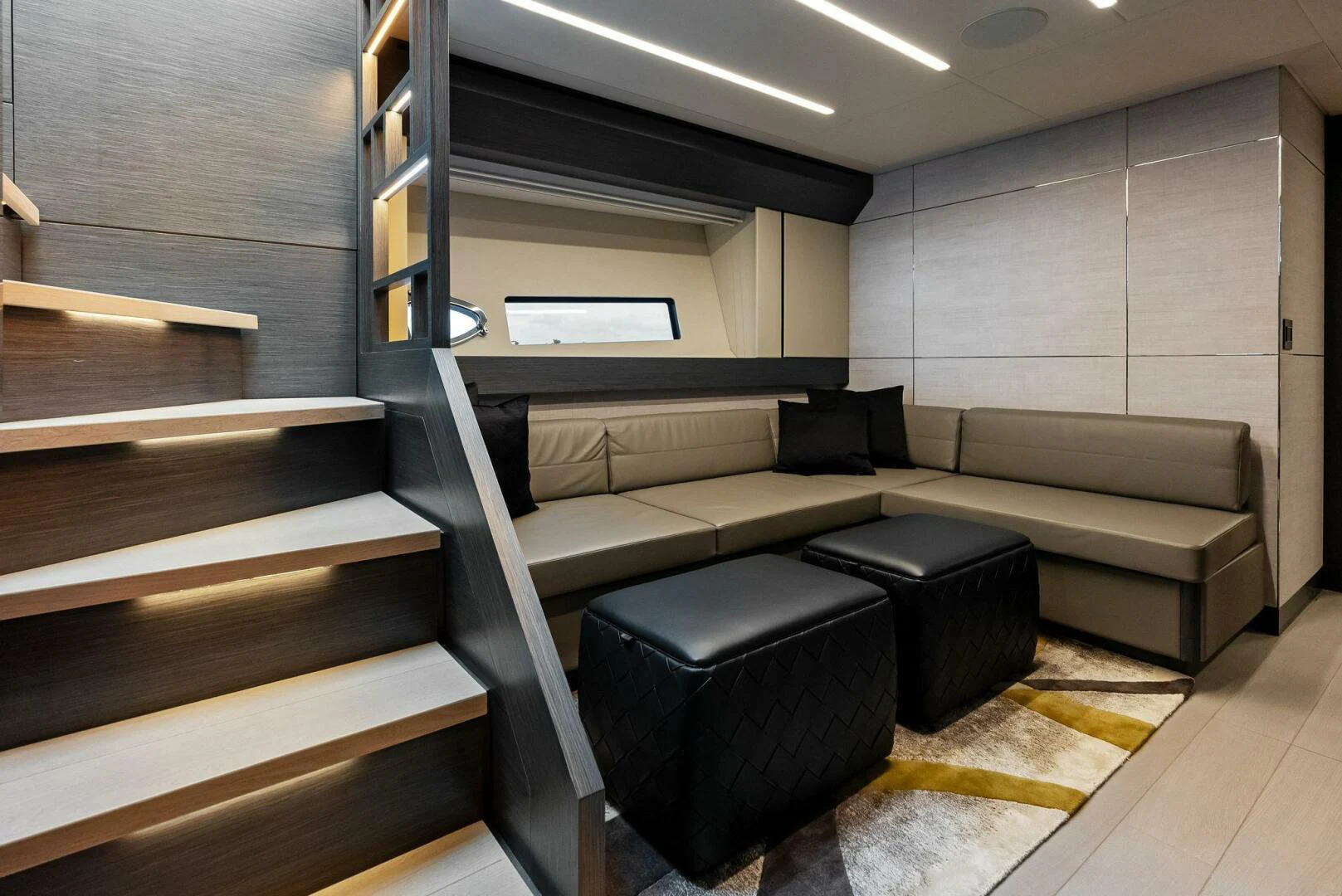 a room with a couch and a table aboard OUR TRADE Yacht for Sale