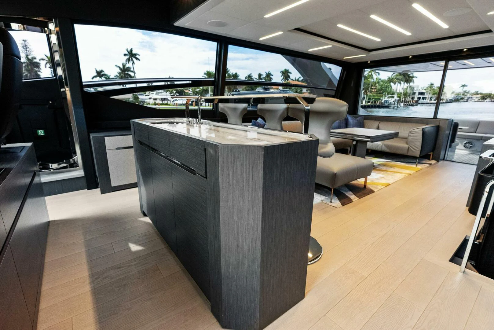 a large room with a table and chairs aboard OUR TRADE Yacht for Sale