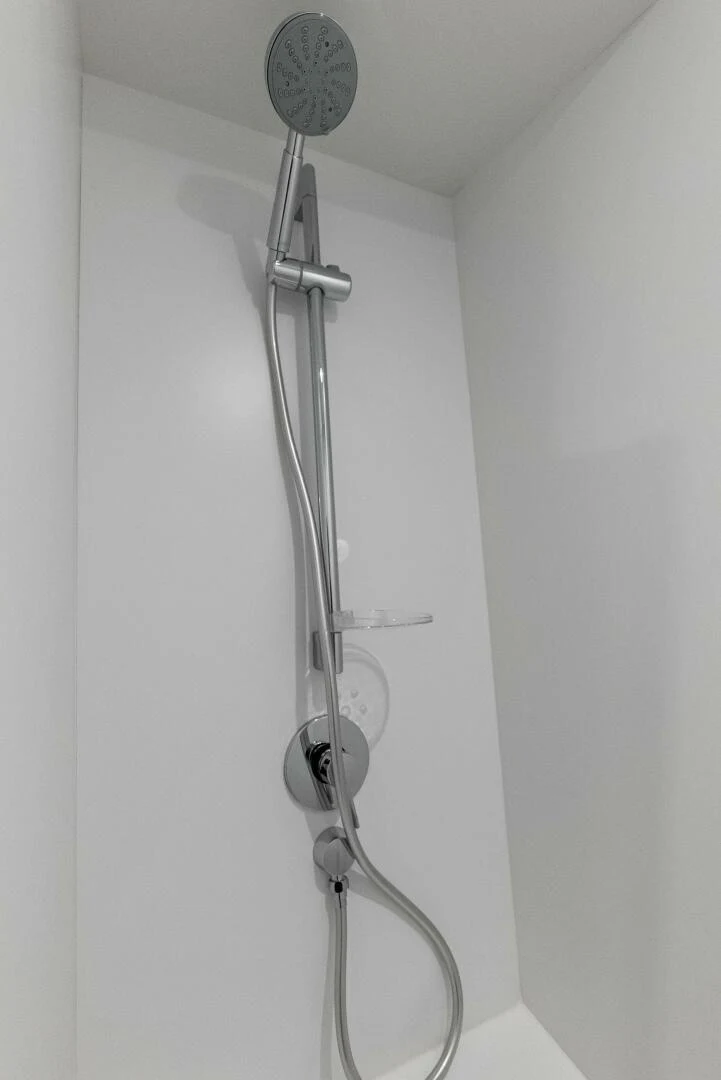 a silver shower head aboard OUR TRADE Yacht for Sale