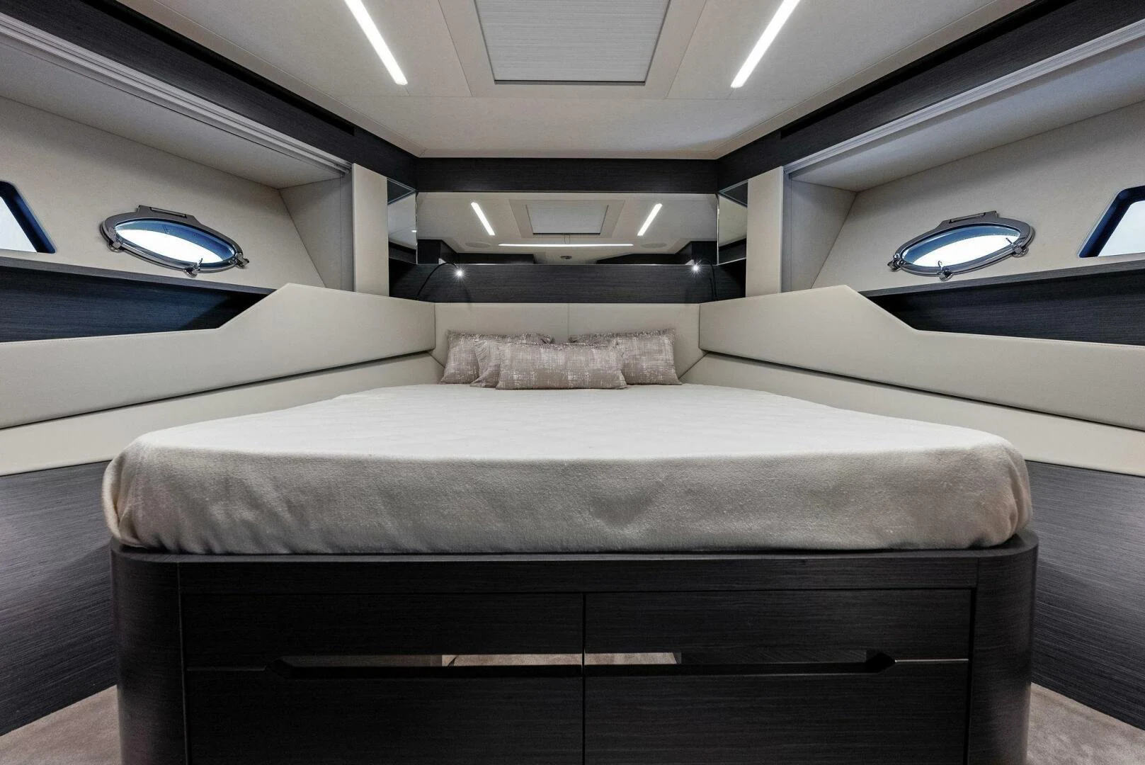a bed in a room aboard OUR TRADE Yacht for Sale