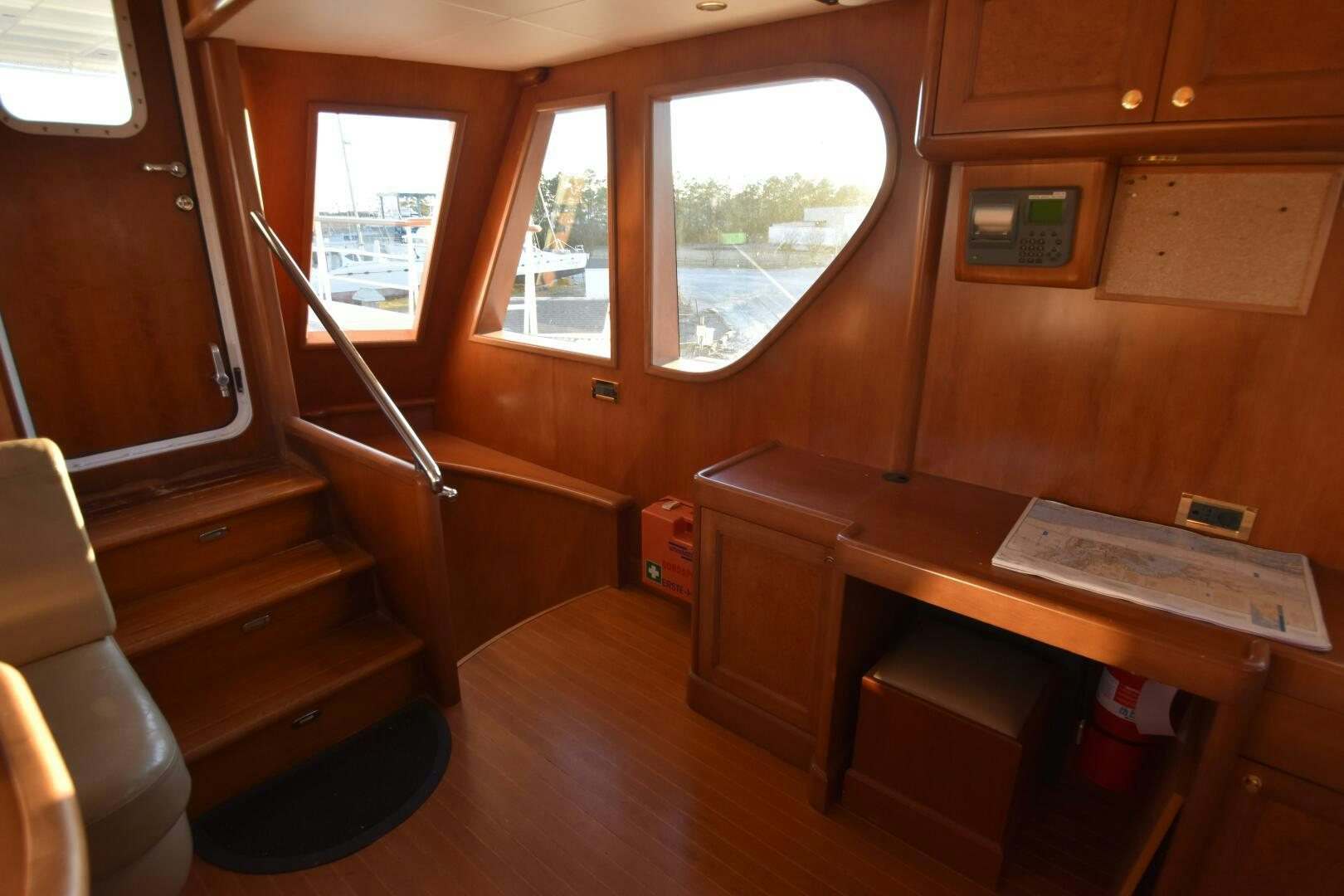 a room with a desk and a window aboard BLUE SEAS Yacht for Sale