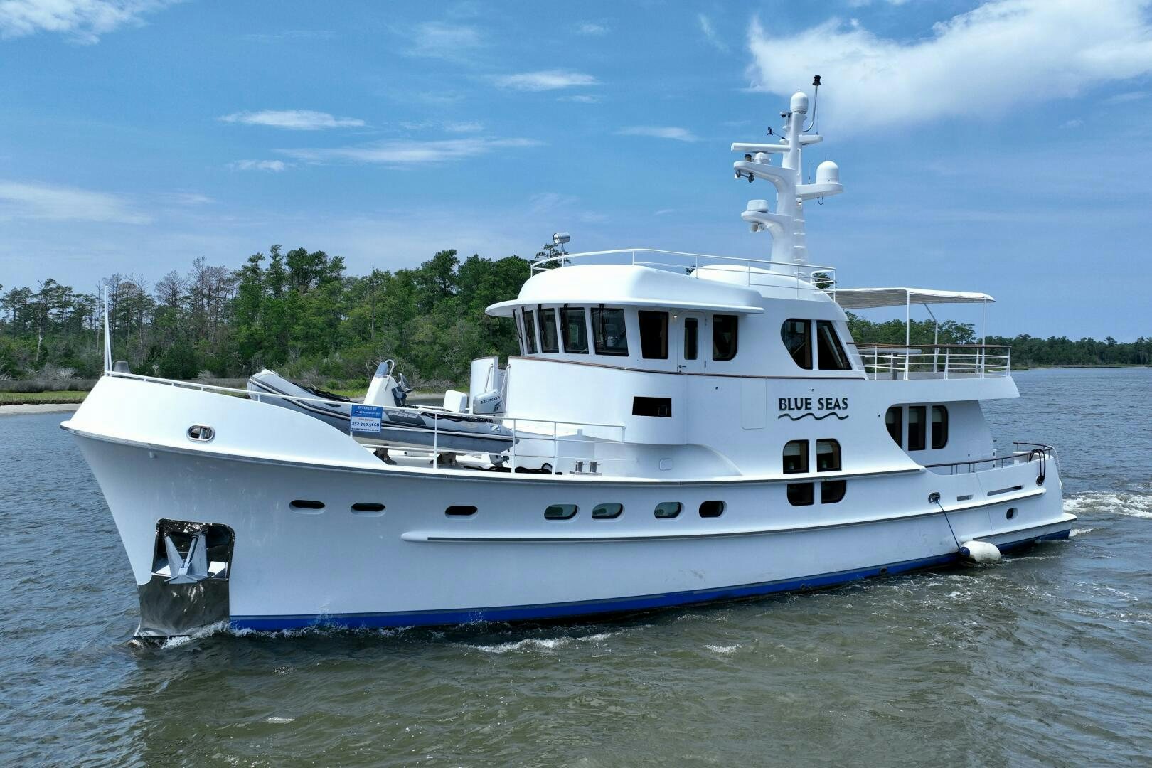 a large white boat in the water aboard BLUE SEAS Yacht for Sale