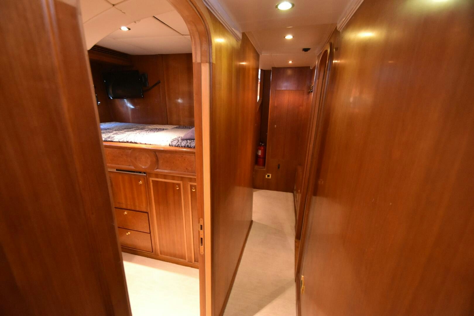 a room with wooden cabinets aboard BLUE SEAS Yacht for Sale