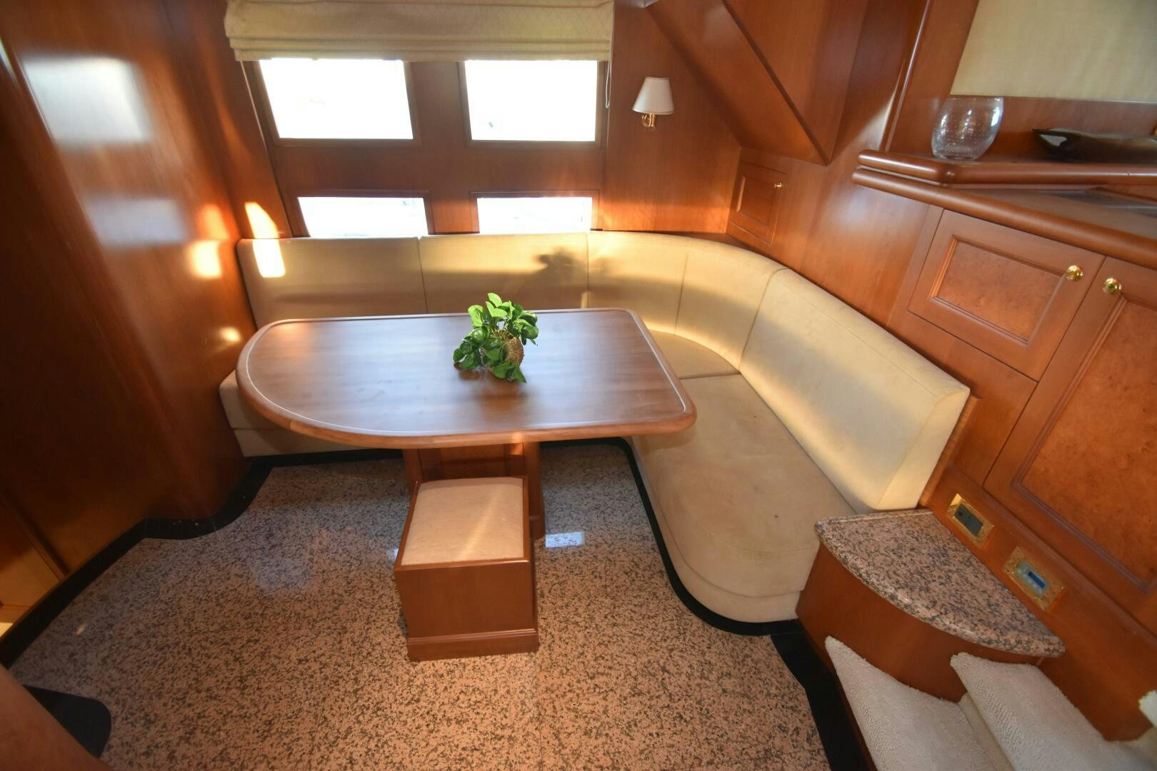 a living room with a couch and coffee table aboard BLUE SEAS Yacht for Sale
