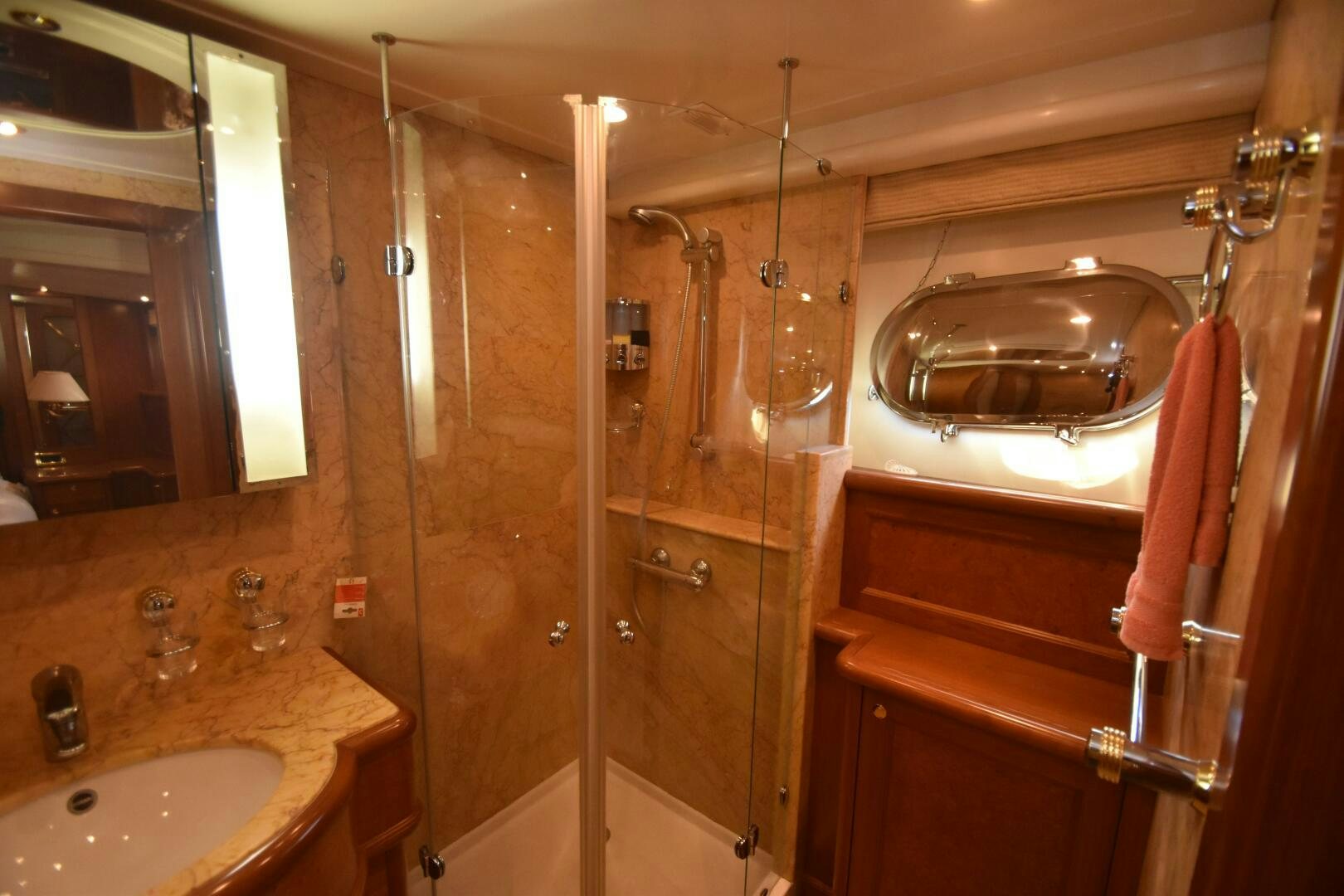 a bathroom with a shower and sink aboard BLUE SEAS Yacht for Sale