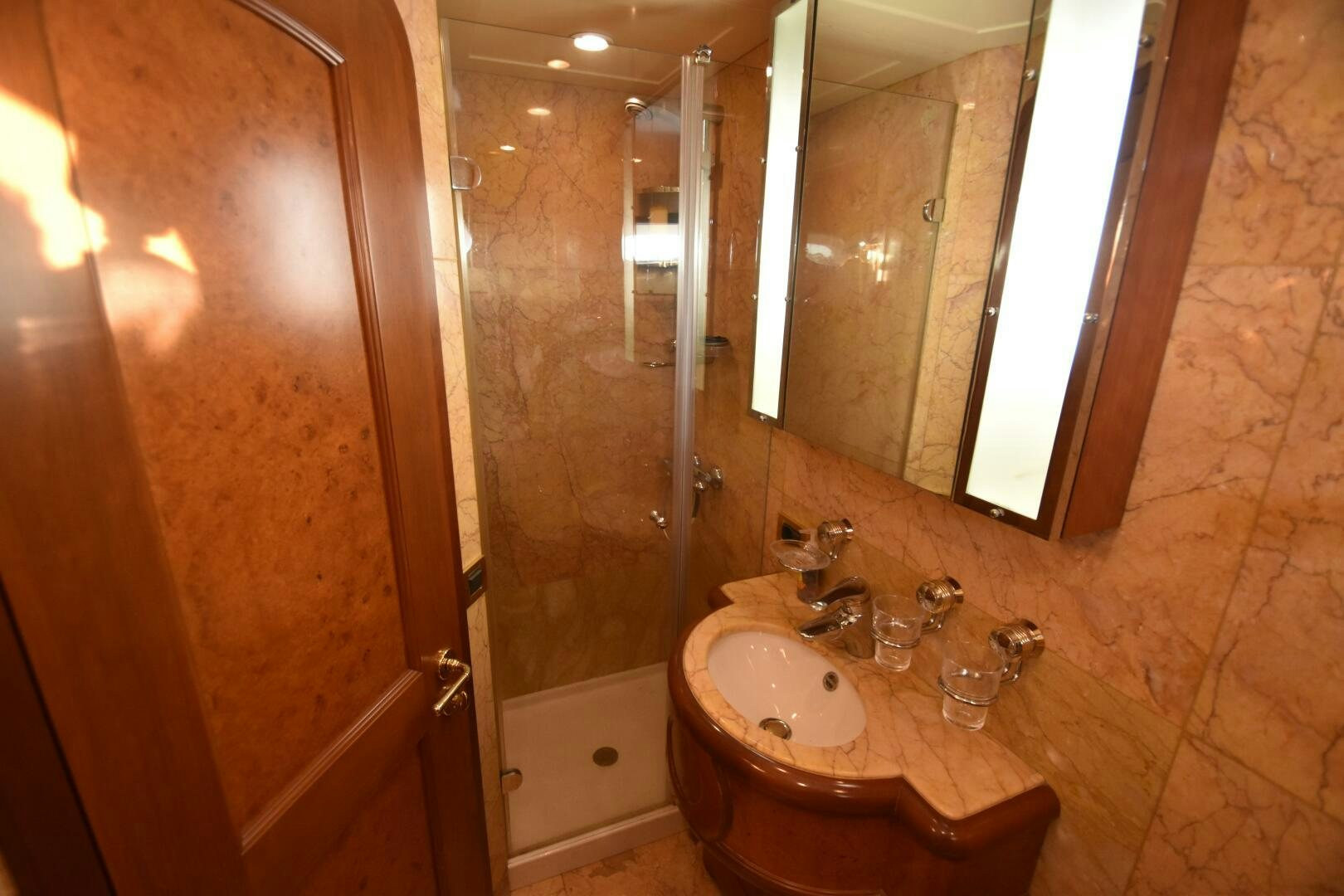 a bathroom with a sink and a shower aboard BLUE SEAS Yacht for Sale