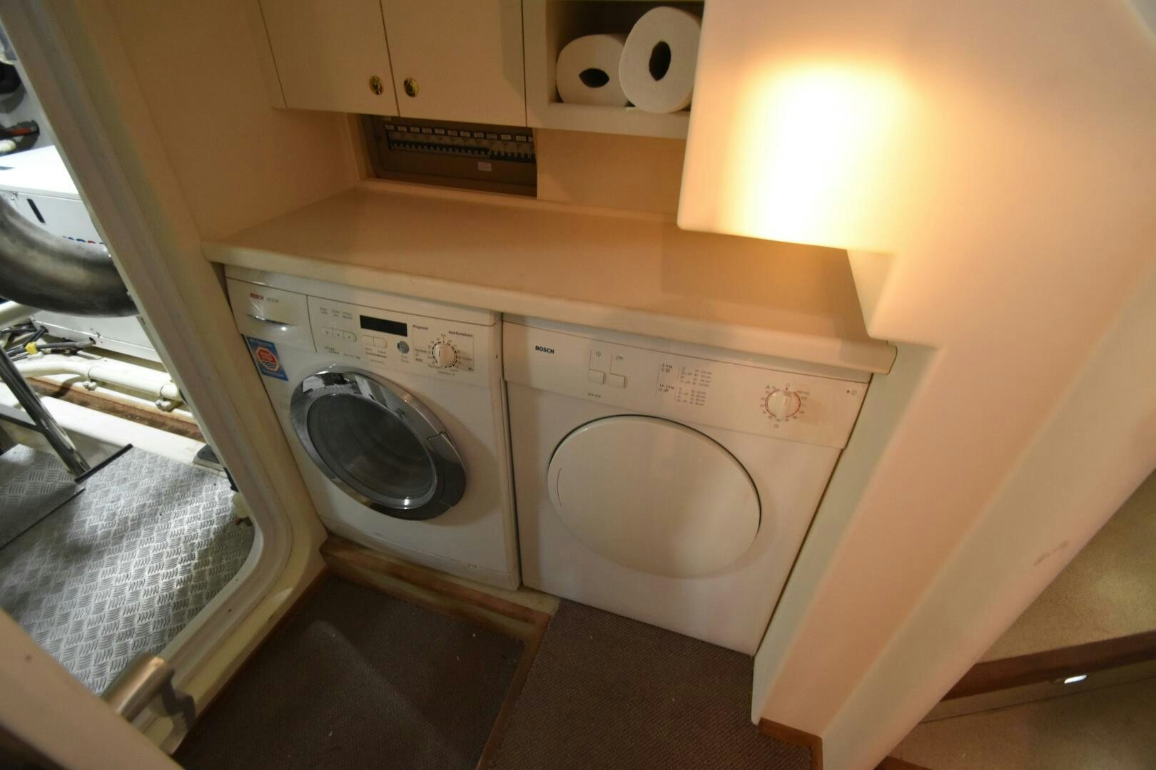 a washer and dryer in a room aboard BLUE SEAS Yacht for Sale