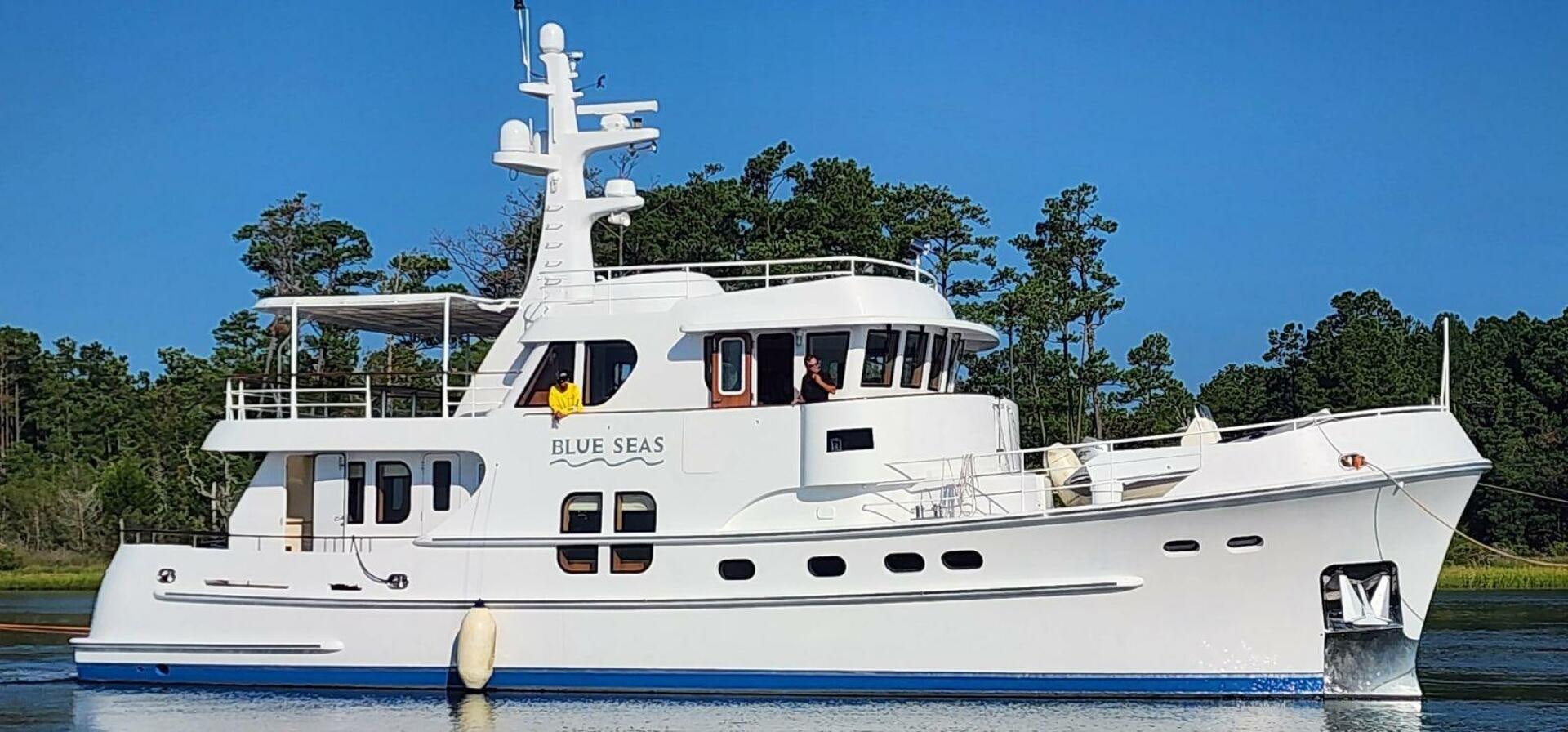 a white boat on the water aboard BLUE SEAS Yacht for Sale