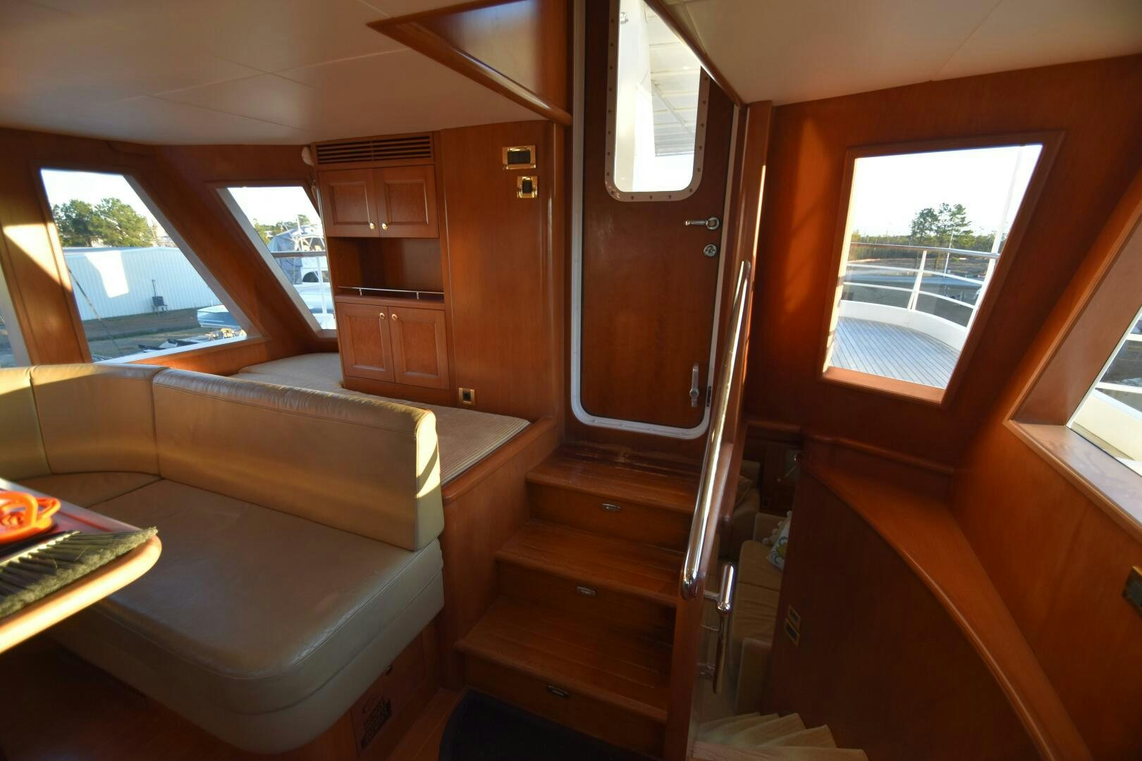 a room with a couch and a window aboard BLUE SEAS Yacht for Sale