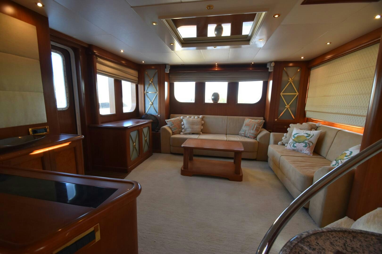 a room with a couch and a table aboard BLUE SEAS Yacht for Sale