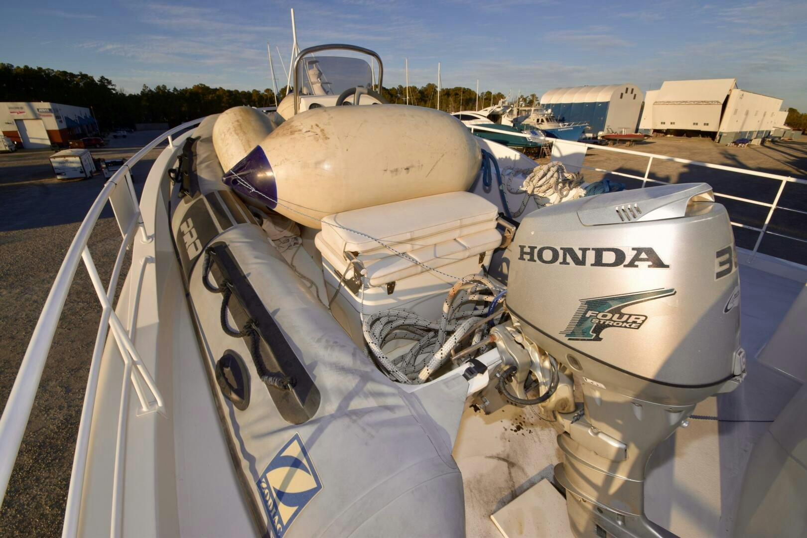 a white boat on a dock aboard BLUE SEAS Yacht for Sale