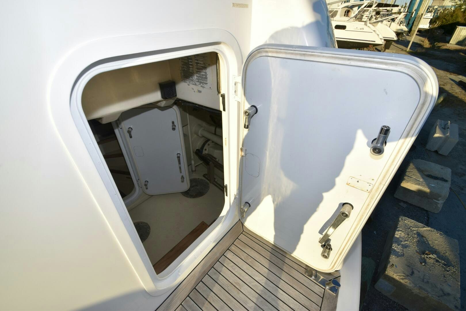 a white car with a door open aboard BLUE SEAS Yacht for Sale