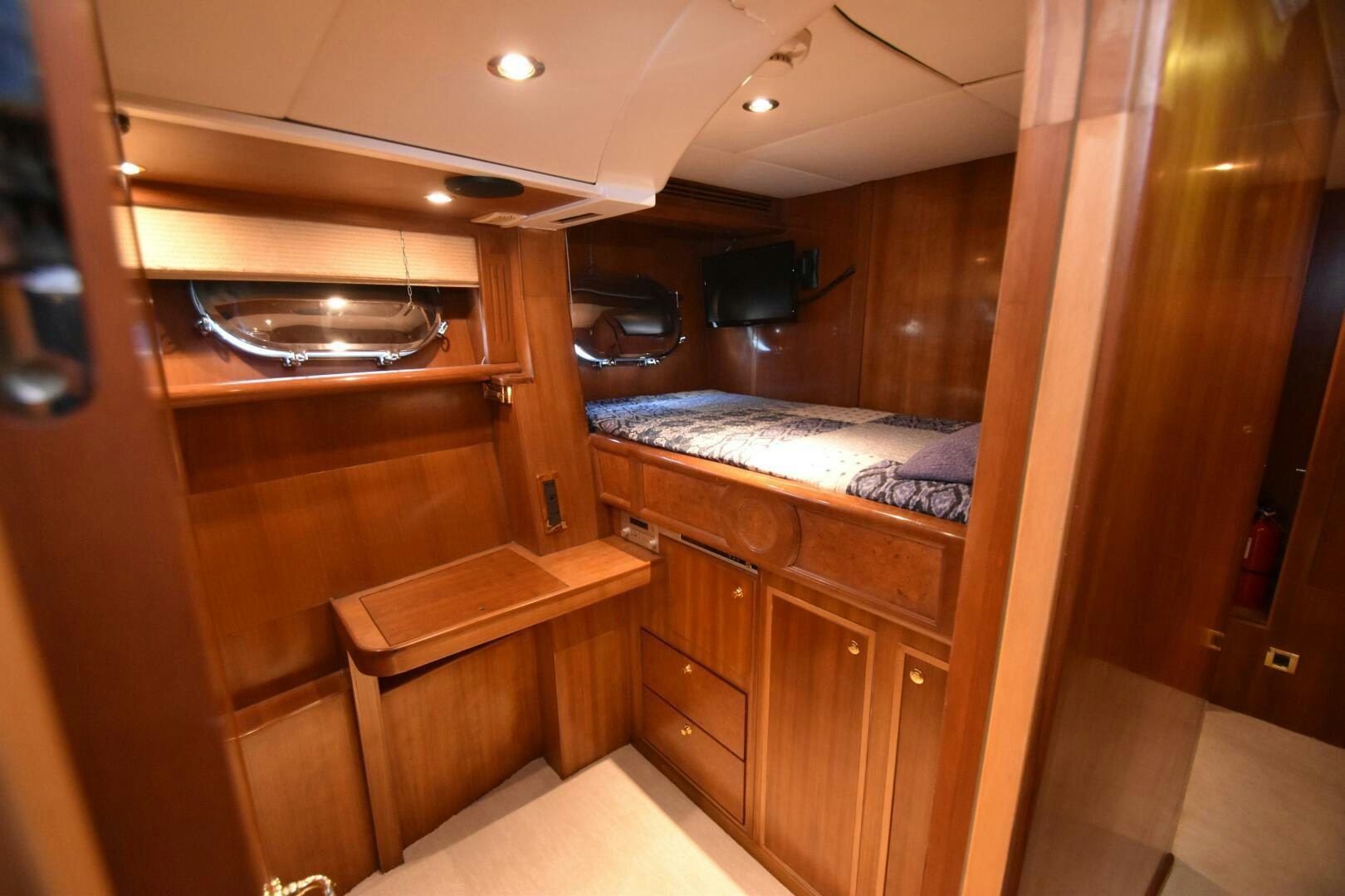 a room with a bed and a table aboard BLUE SEAS Yacht for Sale