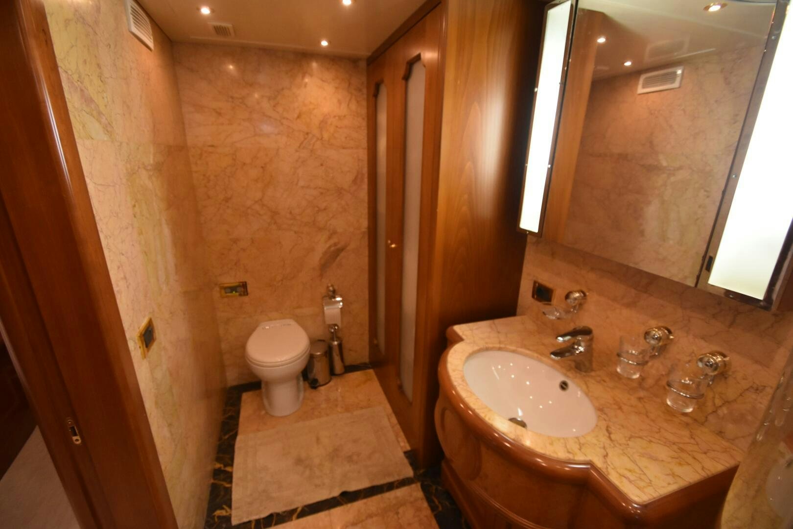 a bathroom with a sink and a toilet aboard BLUE SEAS Yacht for Sale