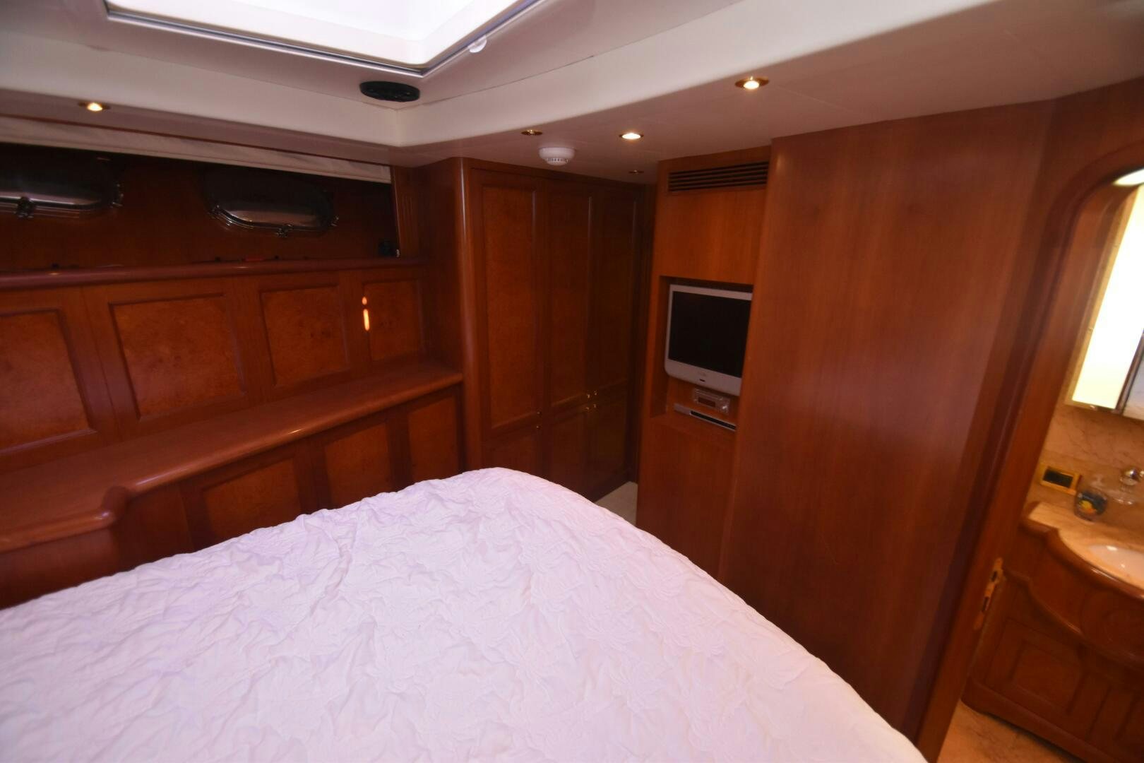a bed in a room aboard BLUE SEAS Yacht for Sale