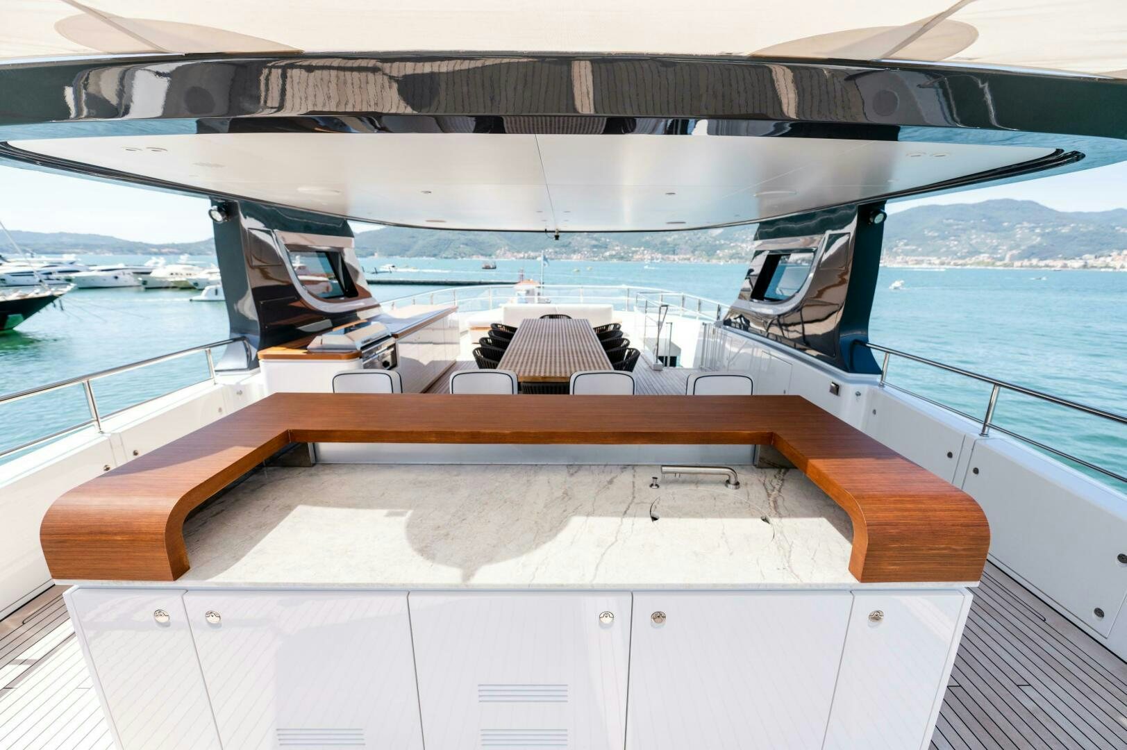 a deck with a deck and a pool aboard SEAESTA Yacht for Sale