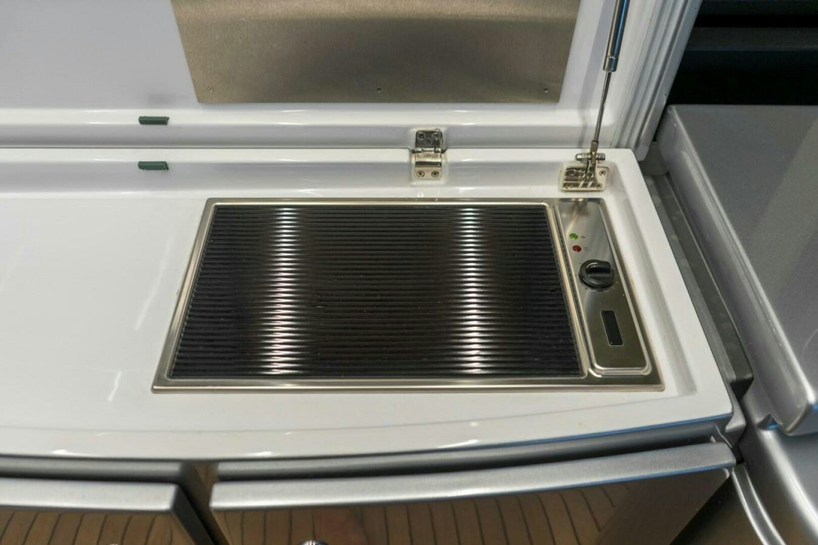 a white microwave oven aboard STAR Yacht for Sale