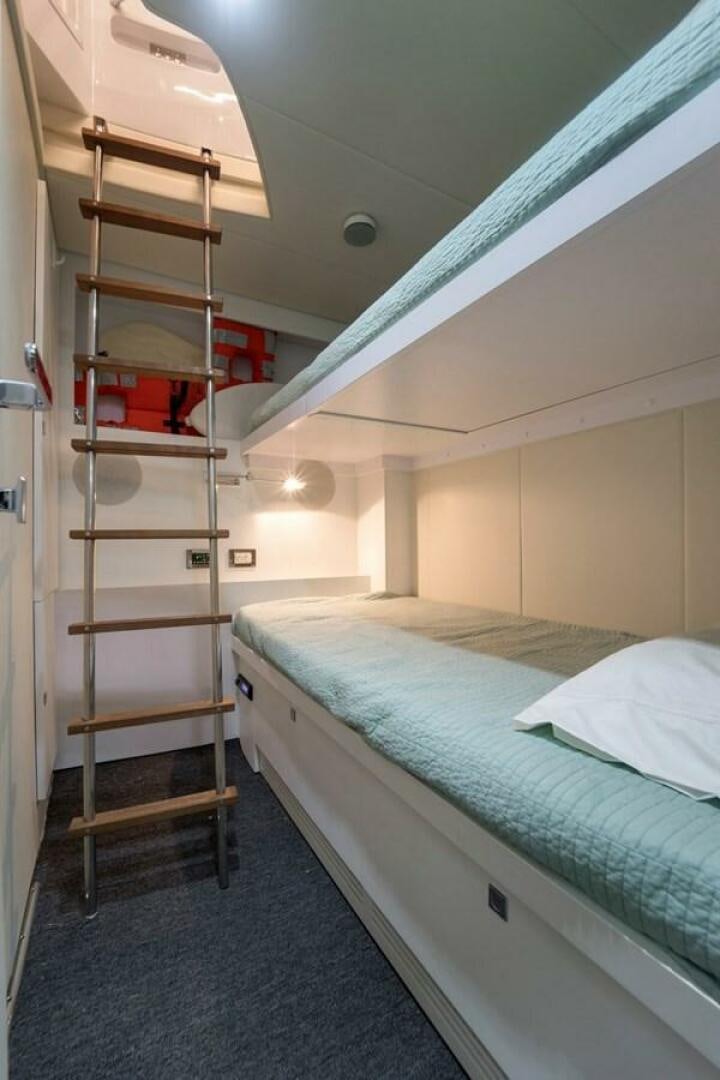 bunk beds in a room aboard STAR Yacht for Sale