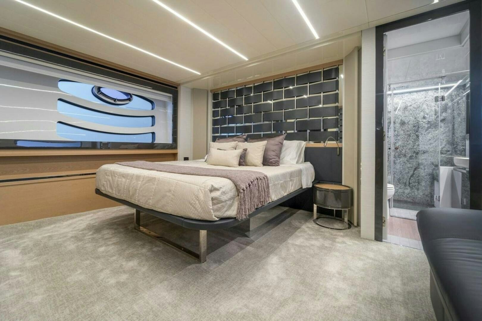 a bed in a room aboard STAR Yacht for Sale