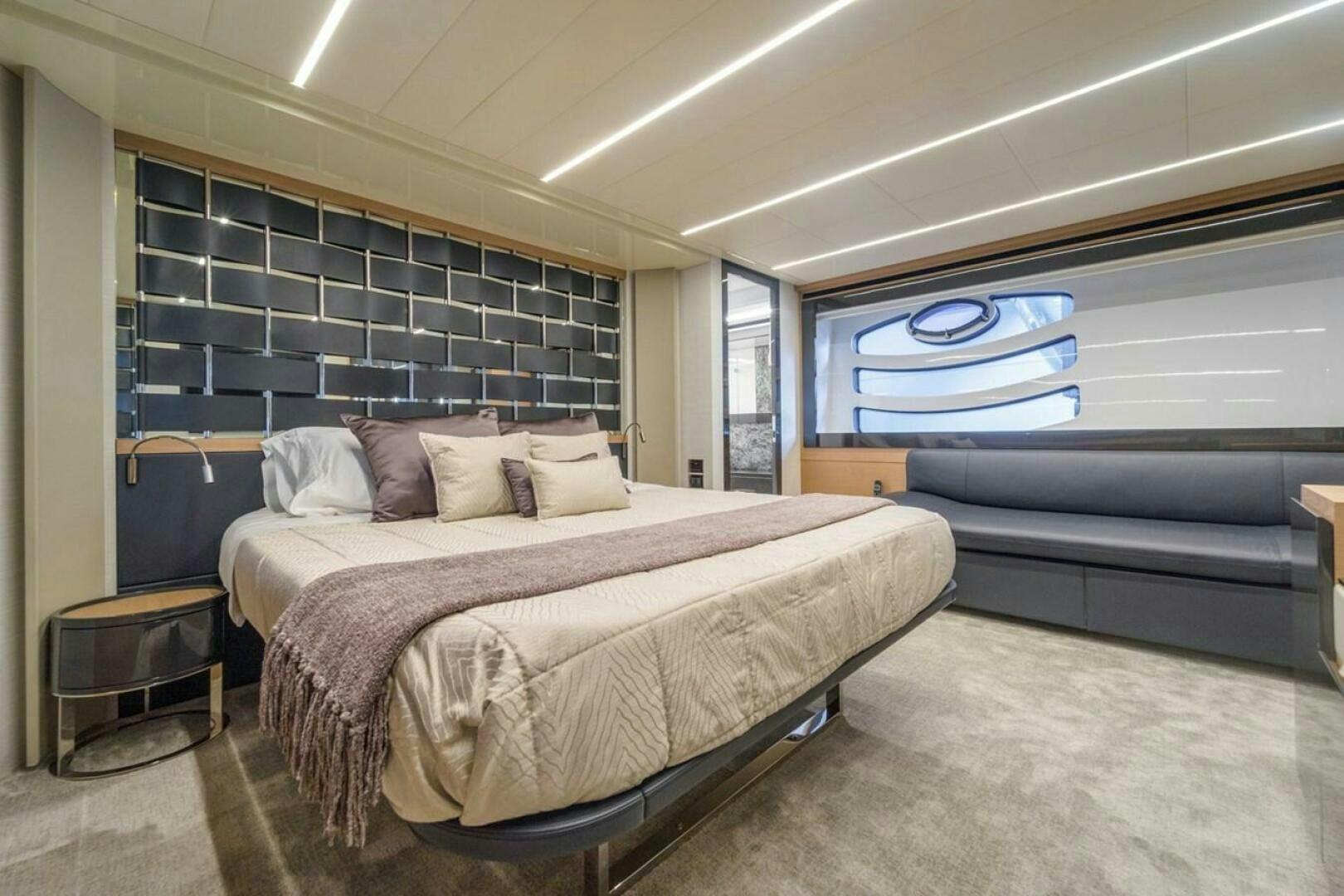 a bedroom with a large bed aboard STAR Yacht for Sale