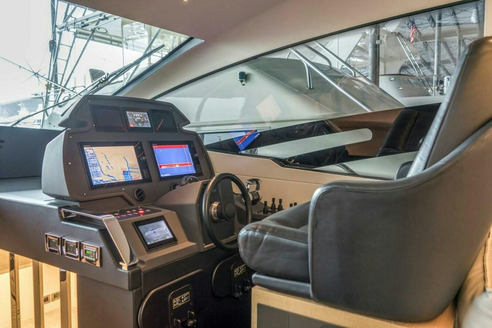 inside of a car aboard STAR Yacht for Sale