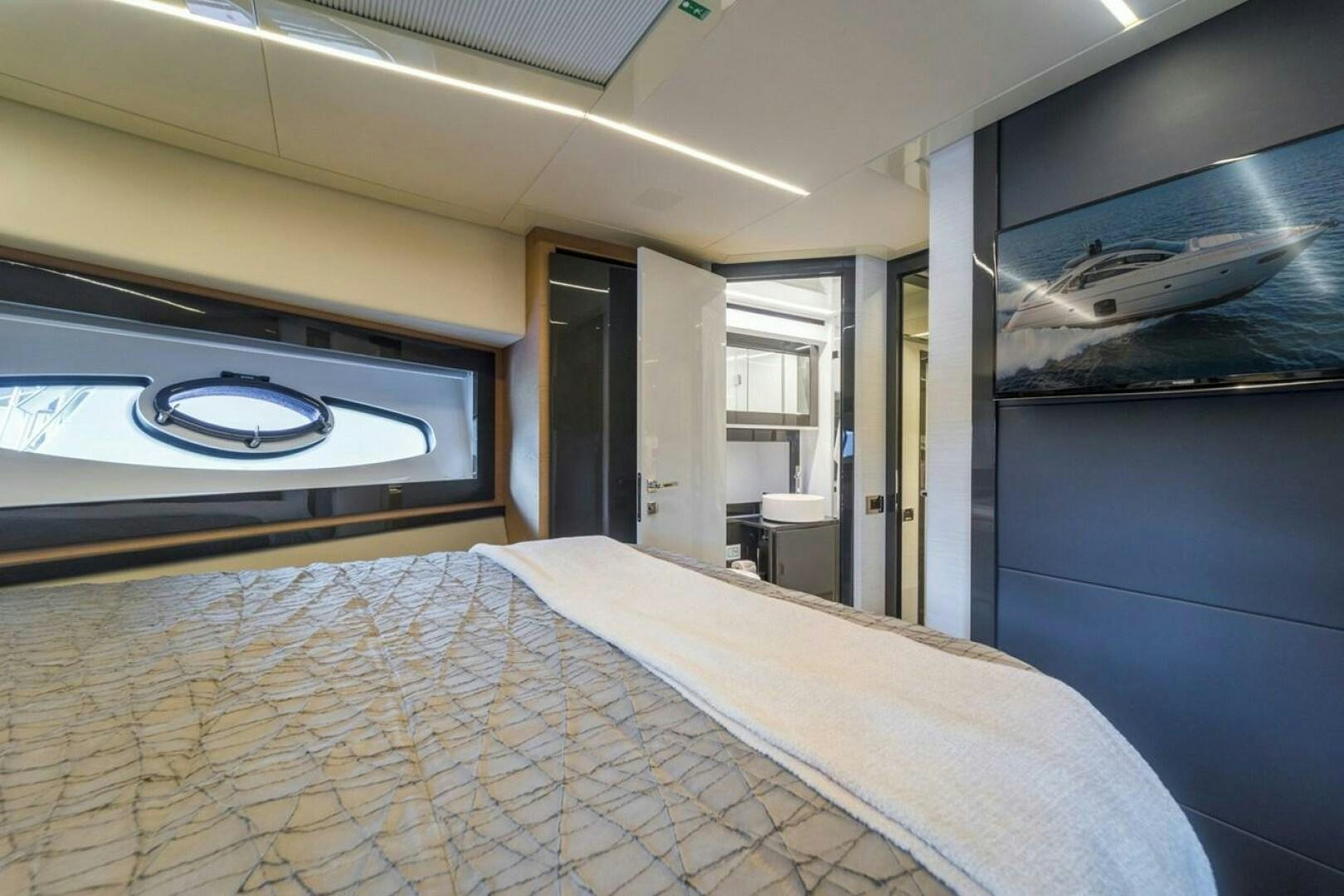 a bed in a room aboard STAR Yacht for Sale