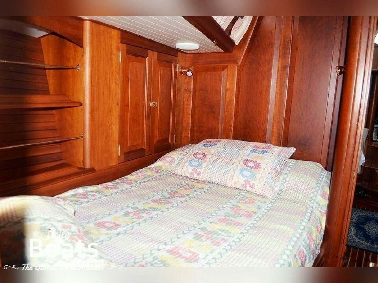a bed in a room aboard SEE ADLER Yacht for Sale