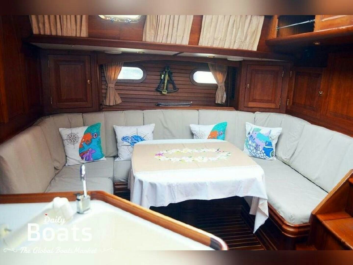a room with a bed and a table aboard SEE ADLER Yacht for Sale